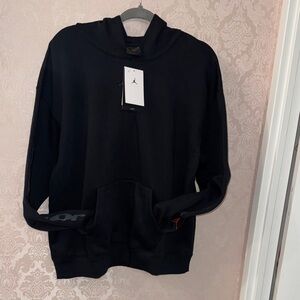 Jordan Women’s Black Hoodie with Small Red Jumpman Detail